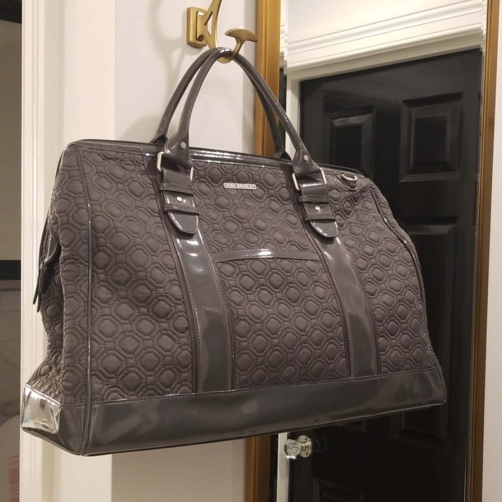 Vera Bradley gray quilted weekender duffel bag.